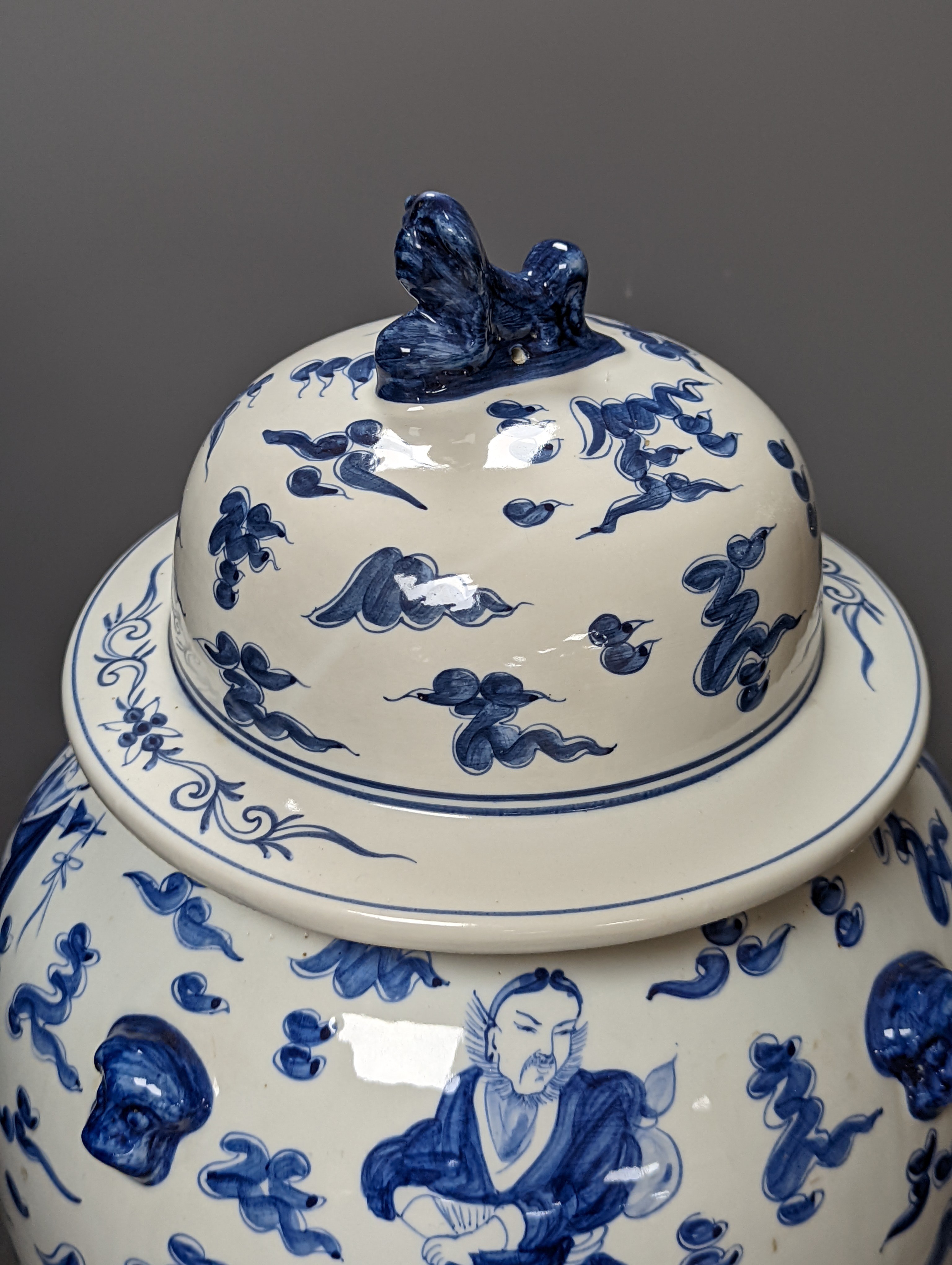A large Chinese blue and white baluster jar and cover and matching vase, tallest 55 cms high.